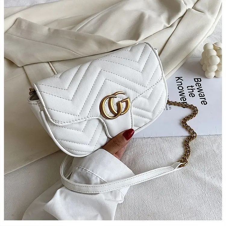 حقيبة كتف احترافية أنيقة للنساء أثناء السفر مع مادة من جلد الغزال ومقصورات متعددة وسطح ناعم ومريح