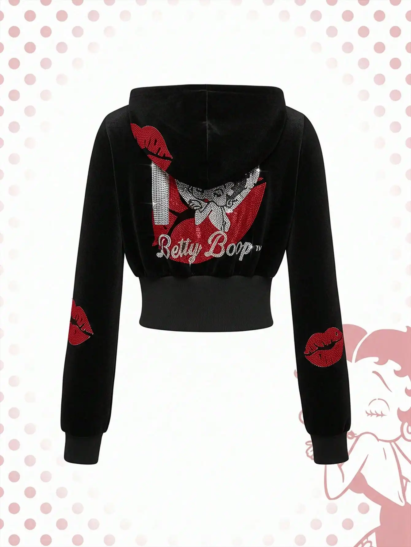 

Женский комплект из двух предметов: укороченная куртка с капюшоном на молнии с бархатным покрытием в стиле Y2K, украшенная стразами в виде красных губ, и расклешенные брюки.