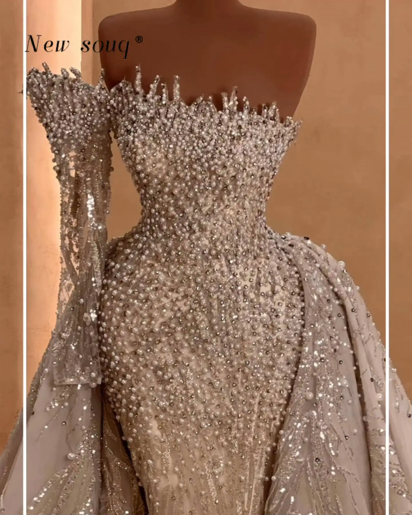 

2024 Dubai One Shoulder Long Sleeve Mermaid Wedding Dresses with Deatchable Train Gorgeous Pearls Beaded Two Pieces Bridal Gowns