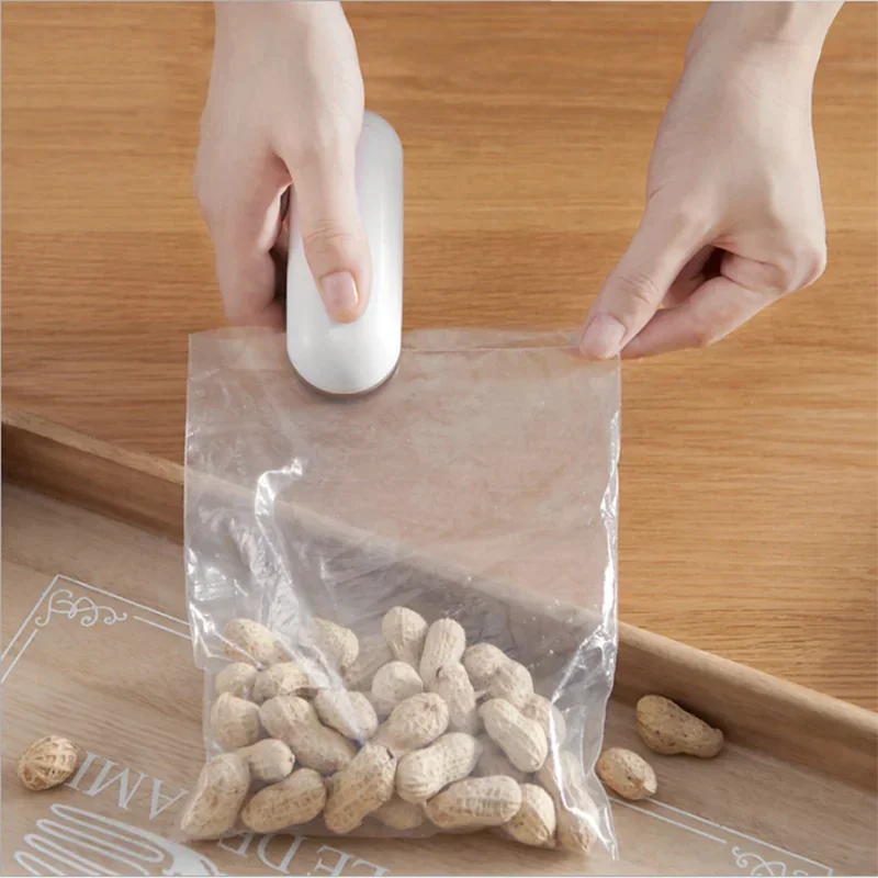 

Портативные мини-гаджеты, пищевой экономщик, термосварщик, укупорочная машина для упаковки пластиковых пакетов, бытовая машина