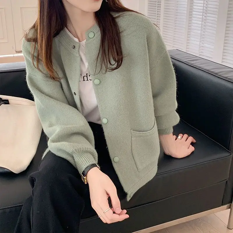 

Fresh and Sweet Women Spring and Autumn New Spliced O-Neck Button Pocket Fashion Solid Loose Casual Long-sleeved Knitted Top