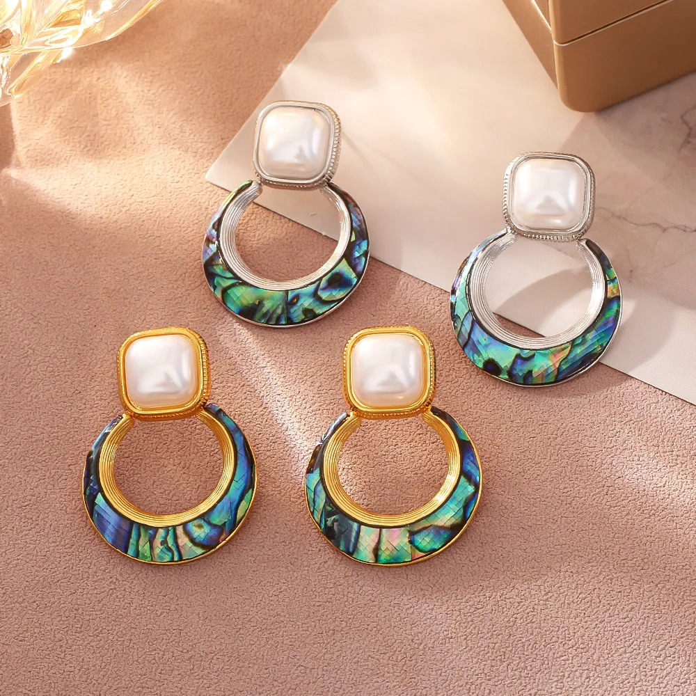 

Light luxury, simple shell round earrings, niche design, high-end abalone earrings, exquisite and versatile personalized earring