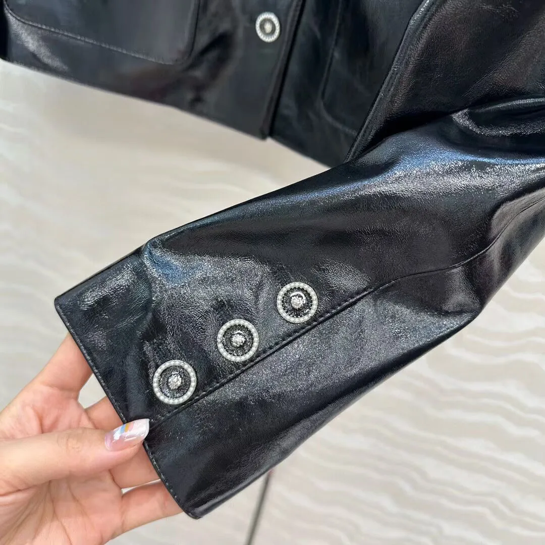 Cappotto nero vintage in pelle di pecora 100% da donna colletto alla coreana manica lunga bottoni in metallo tasche elegante giacca carina dal design corto