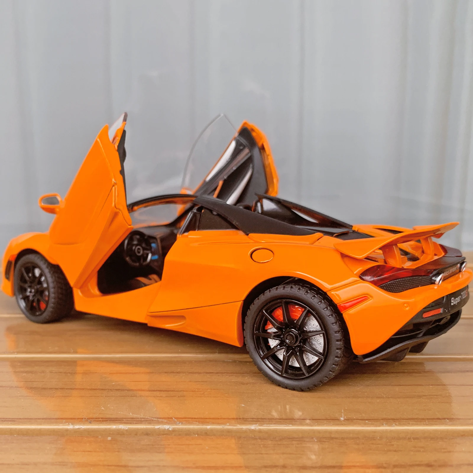 1: 24 720S alloy sports car model with four wheels and shock absorption function, suitable as a holiday gift for children