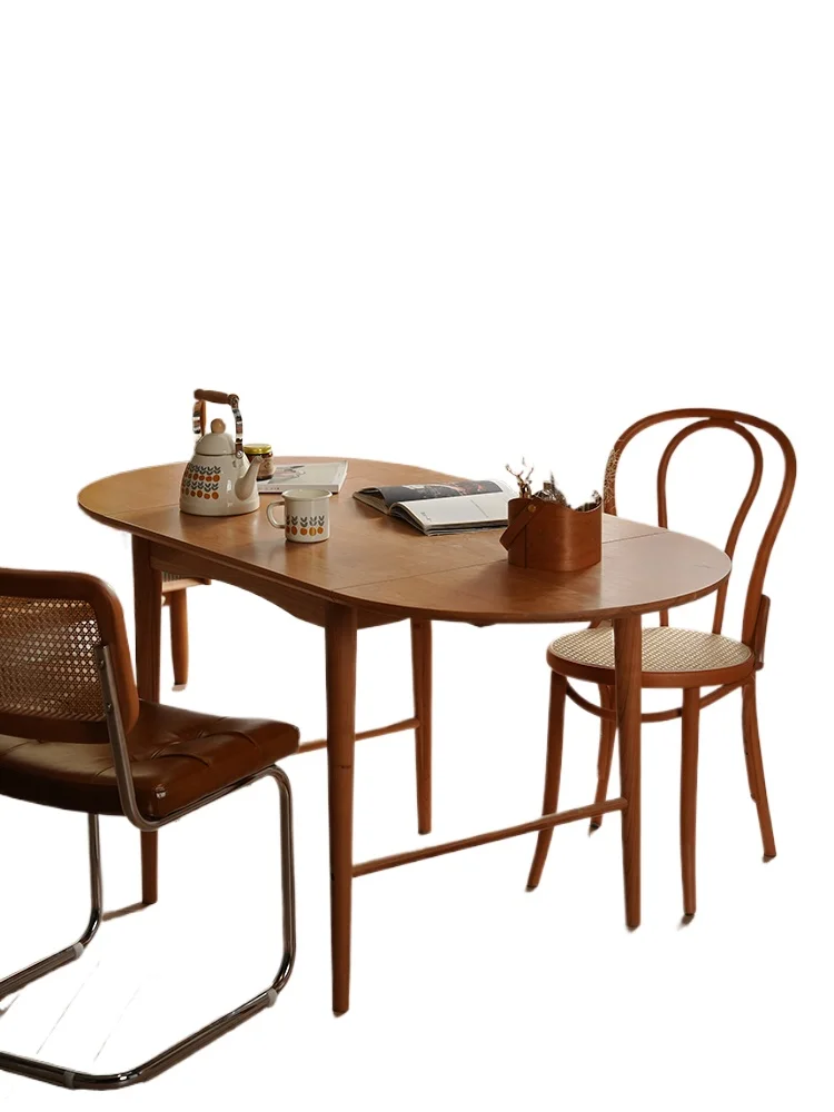 

Nordic solid wood folding dining table ins wind small apartment oval dining table and chair combination cherry wood dining table