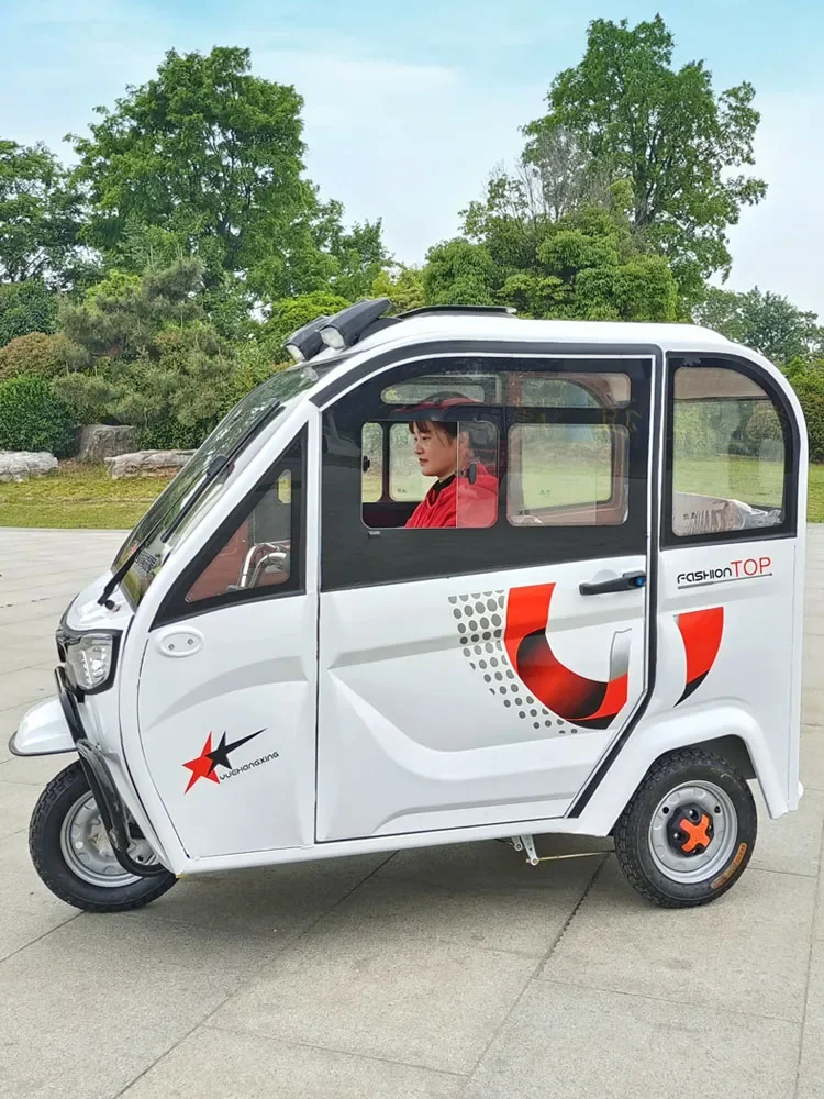 enclosed electric tricycle with shed for home transportation of children, small delivery battery, three cars can be licensed