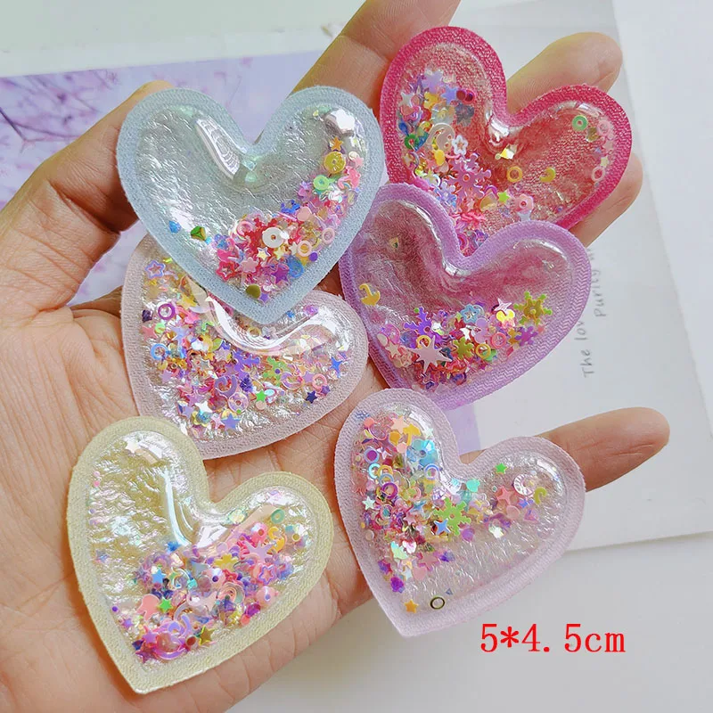 20pcs PVC Quicksand Cartoon Heart trasparente Bling Flowing patch Appliques per accessori per fascia per bambini fai da te