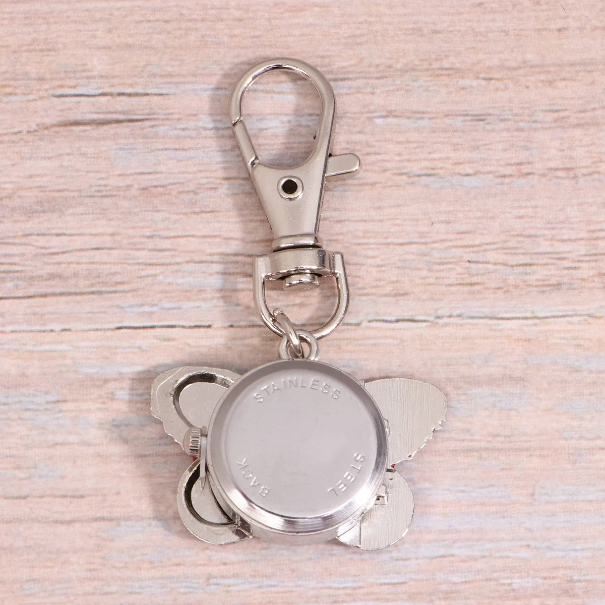 1 قطعة ساعة جيب سلسلة المفاتيح معدنية ممتازة تصميم دائري كبير أرقام كبيرة سهلة القراءة ساعة كوارتز للبالغين المحمولة