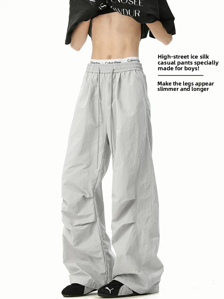 

Тонкие повседневные брюки из ледяного шелка, мужские летние дышащие свободные прямые брюки, американский модный бренд, плиссированные спортивные длинные брюки десантника...