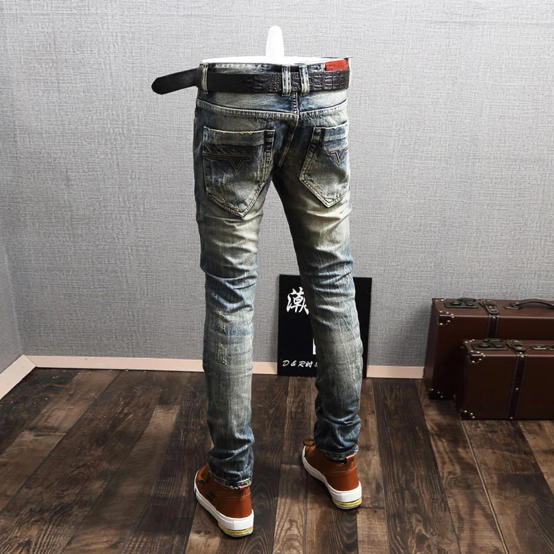 Streetwear moda masculina calças de brim retro azul fino ajuste destruído rasgado jeans retalhos designer vintage casual denim calças hombre