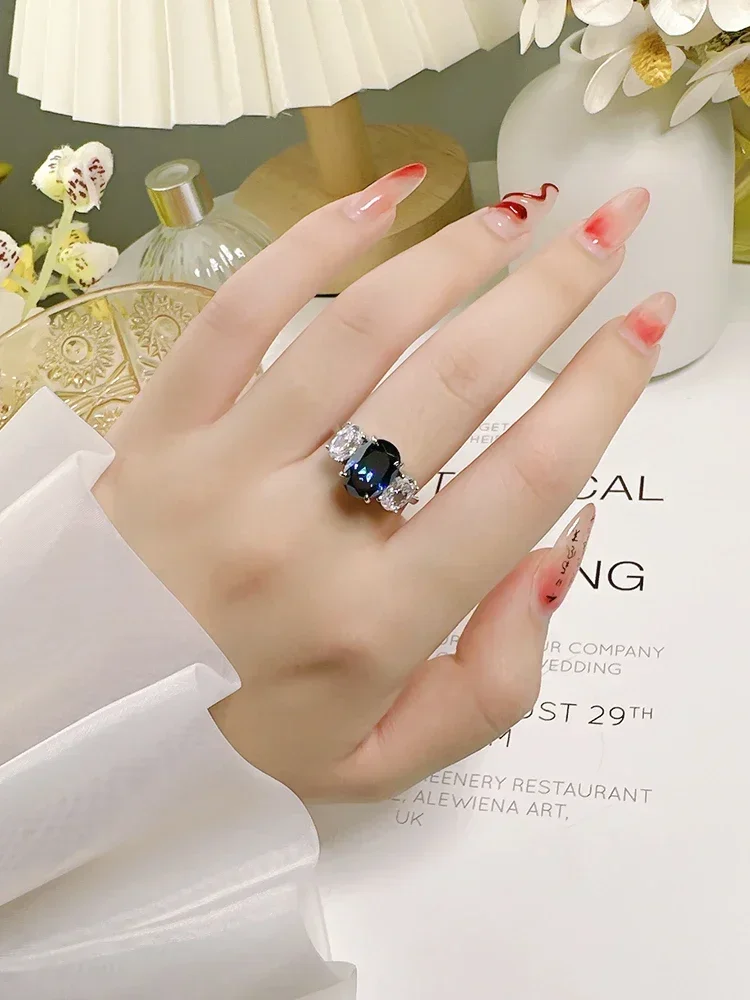 Wholesale of Light Luxury Chinese Made Treasure Blue Three Stone 925 Silver Ring Inlaid with High Carbon Diamond Wedding Jewelry