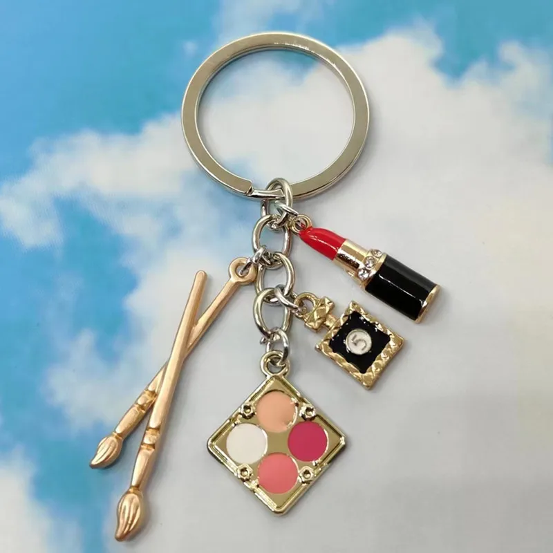 Fashion Beauty Cosmetics Key Chain Lipstick Makeup Pen perfume Bottle Enamel Mixed Powder Makeup Key Chain Beauty Jewelry