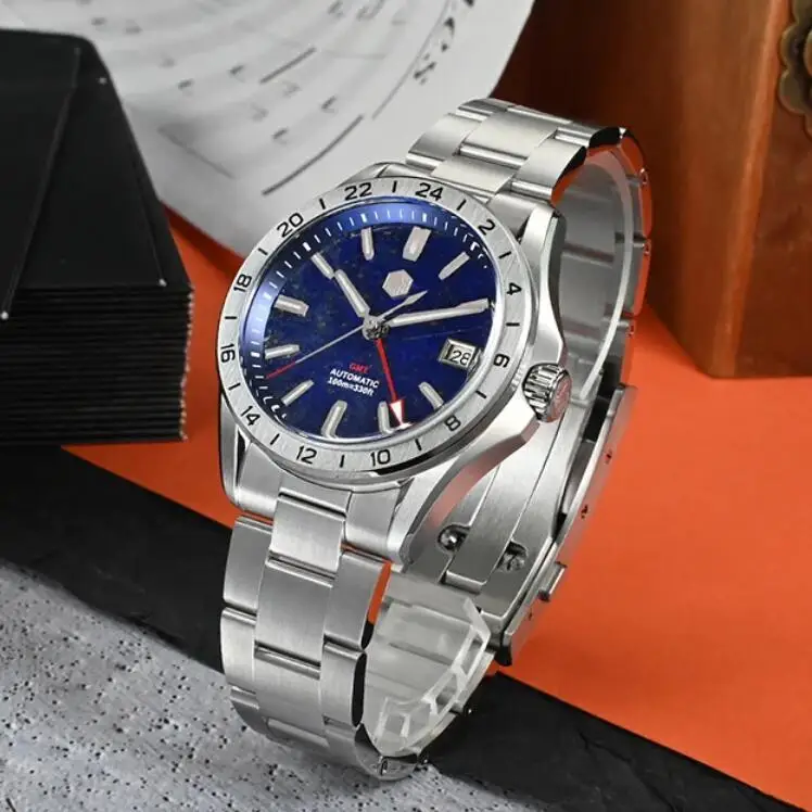 

Мужские часы San Martin GMT, 39 мм, автоматические механические наручные часы, 10 АТМ, водонепроницаемые, со светящимся сапфиром, NH34, авантюрин, циферблат с драгоценными камнями