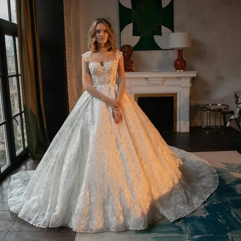 

Customized Luxury Ivory Sweetheart Neck Ball Gown Wedding Dresses Beaded Appliques Shiny Court Train Bridal Dress Vestido de