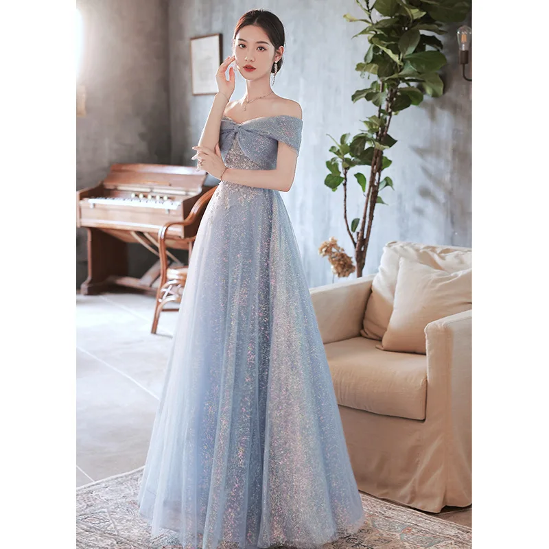 

Evening dress banquet 2026 new blue one-word shoulder sexy temperament host stunning vocal art test dress