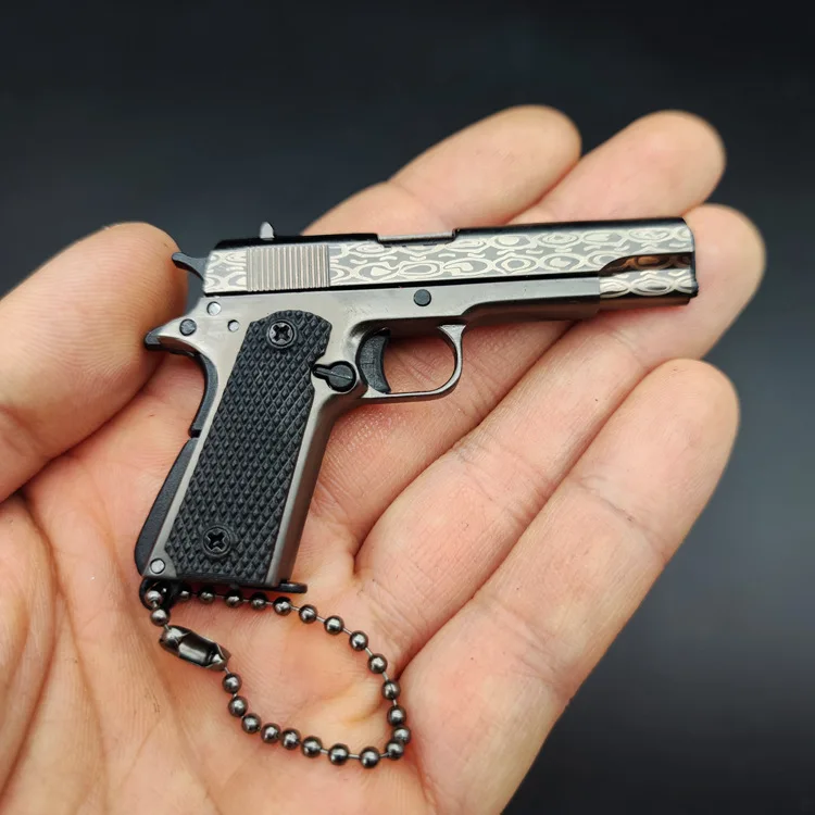 LLavero de pistola de Metal con estampado de Damasco, llavero de juguete con forma de arma de Metal 1911, modelo de pistola desmontable, 1: 3