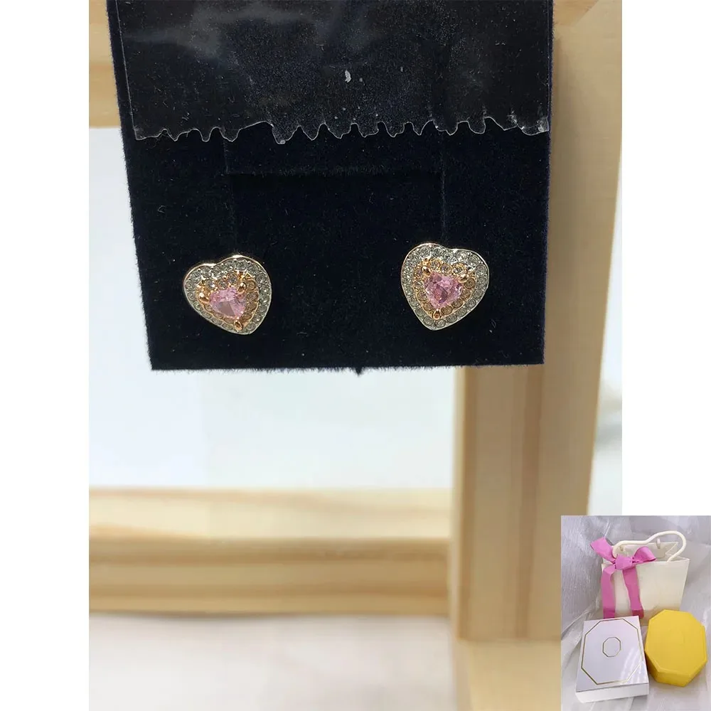 

New hot selling fashionable pink heart-shaped pulsating heart earrings romantic holiday party gifts