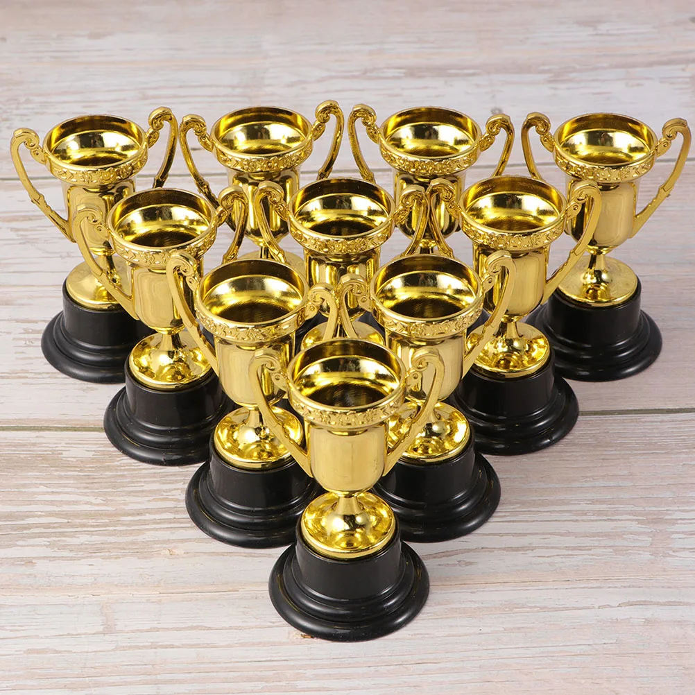 Mini trofeo dorado de 30 piezas para niños, decoración de premios de plástico, juguetes de trofeo pequeño con Base negra