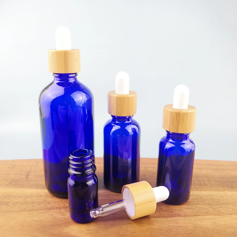 10PCS/LOT Blue Glass Dropper Bottle Refillable Natural Bamboo Cap For Essence Massage Face Oil Aromatherapy Liquid Skincare