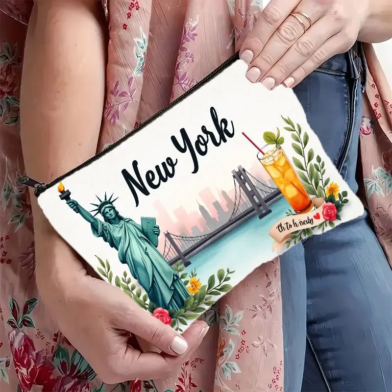 A Stylish Cosmetic Zipper Pouch Featuring The Iconic Statue of Liberty, Brooklyn Bridge, And Skyline of New York City