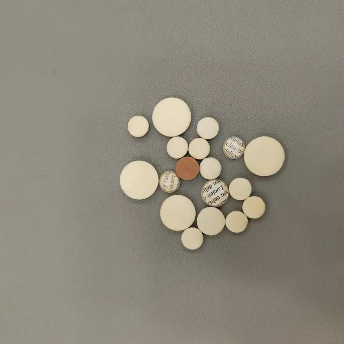 White ring pads for clarinet holes. Bb clarinet pads. 17 pads. Circular patches. Simple.