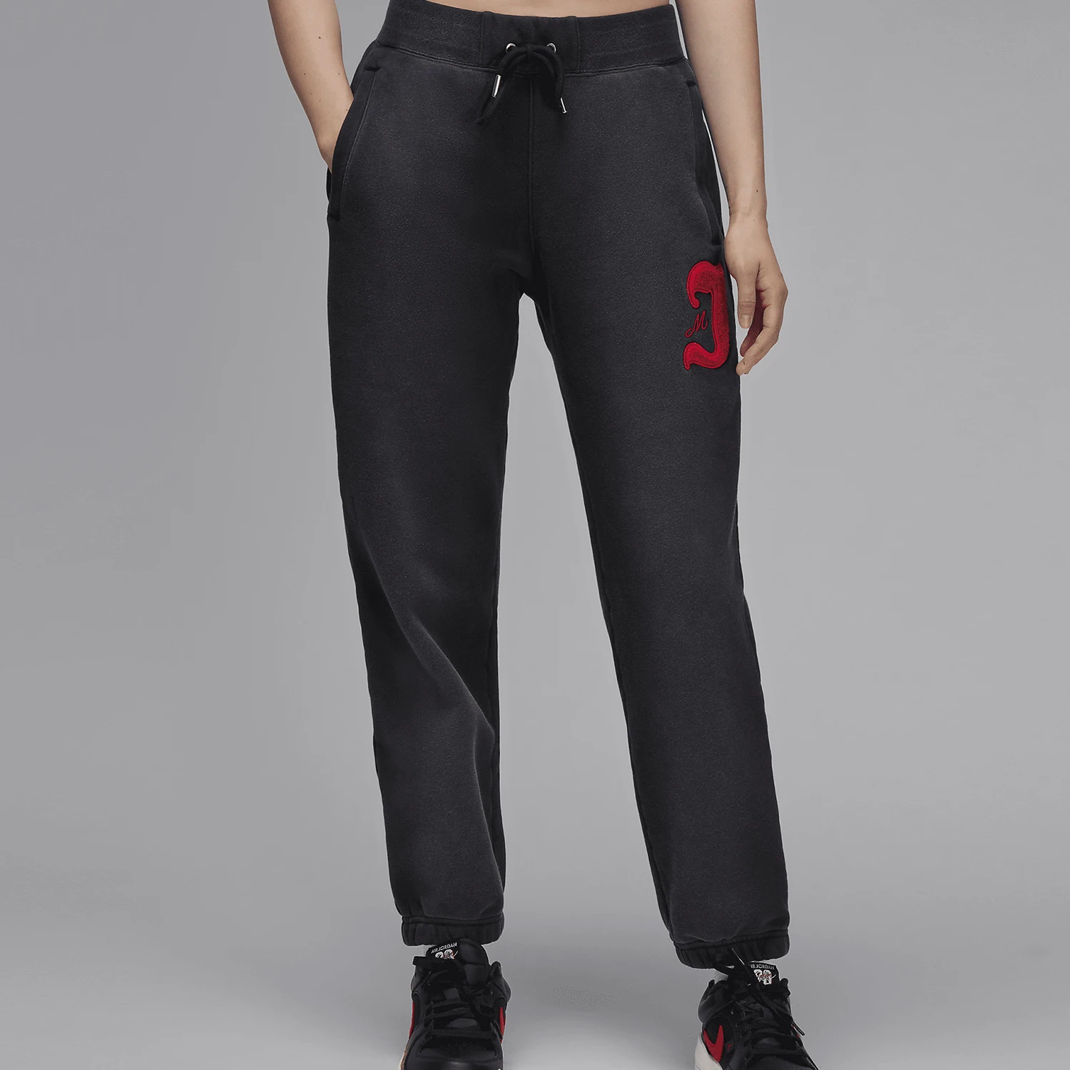 

Оригинальные женские флисовые брюки с манжетами и вышивкой Nike JORDAN FV7069-010