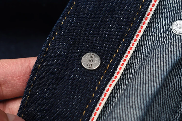 سترة من قماش الدنيم الذيلية الخام المغسول بنسبة 98% من القطن الأمريكي - تتميز بإبزيم النقل ونمط Amekaji الكلاسيكي المطاطي