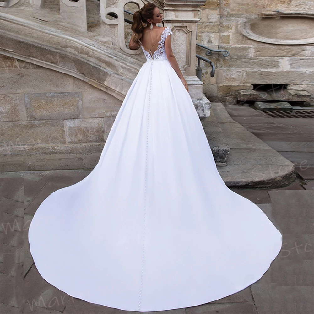 Abiti da sposa classici da donna A Line abiti da sposa in pizzo con applicazioni graziose abiti da sposa senza schienale con maniche A berretto abbastanza moderni