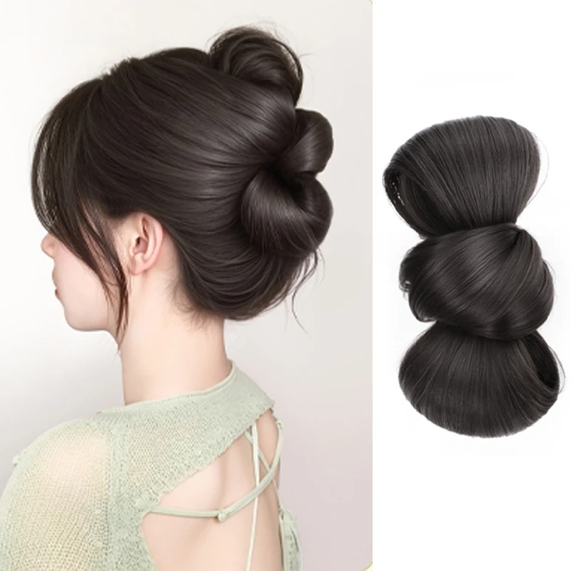 

A lazy, low bun hairstyle with a wig and a flower bud clipping