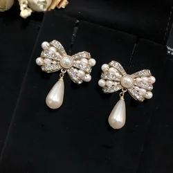 Fashion exquisite personality bow set rhinestone pearl earrings