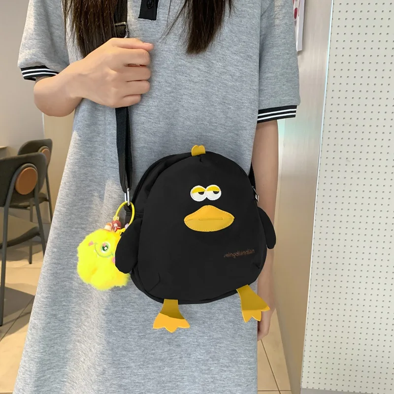 ​ حقيبة ظهر صغيرة من Duck لعام 2025 للفتيات - حقيبة كروس قابلة للتعديل مقاومة للماء، حقيبة كتب نباتية لطيفة ومدرسة غريبة الأطوار أنيقة للأعمار من 12 إلى 16 عامًا ​