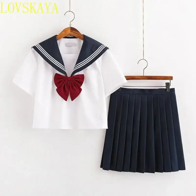 Uniforme scolastica per studentesse, abbigliamento blu navy per ragazze, abito JK sexy blu navy da donna, gonna a pieghe con fiori da marinaio