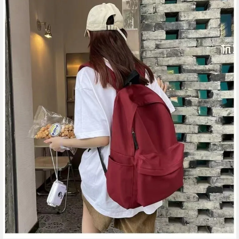 

2025 New Versatile Solid Color Schoolbag for Female Students, Large Capacity Backpack for Junior High School Students, College