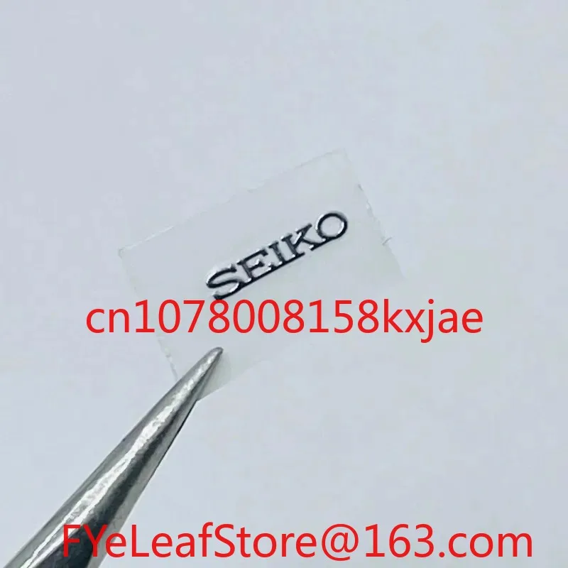 شاهد ترصيع الشعار الحرفي، وملصقات الشعار المعدنية، وملصقات الملصقات على شكل حرف S