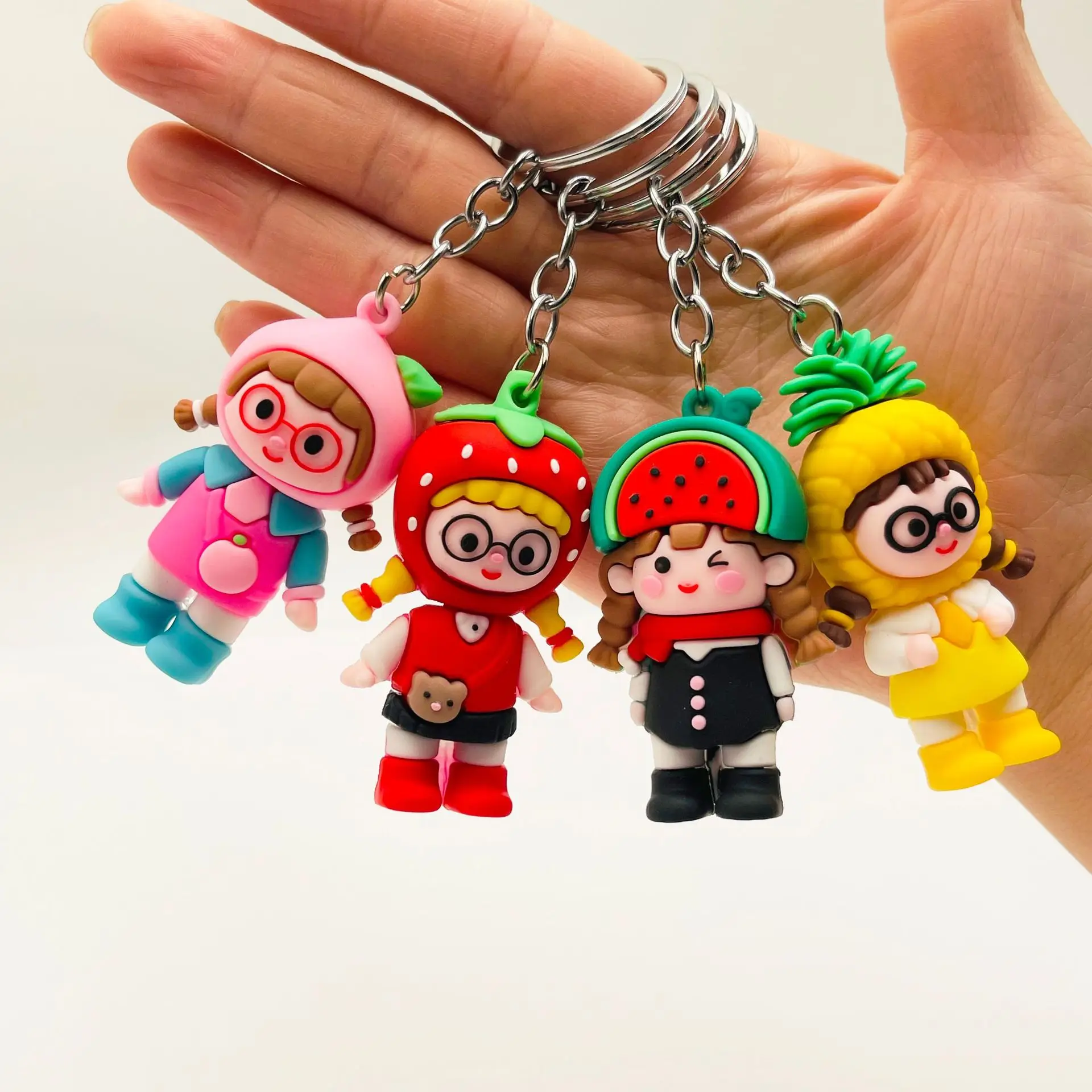 Cartoon fruit girl keychain cute watermelon strawberry braided girl doll pendant activities gifts.