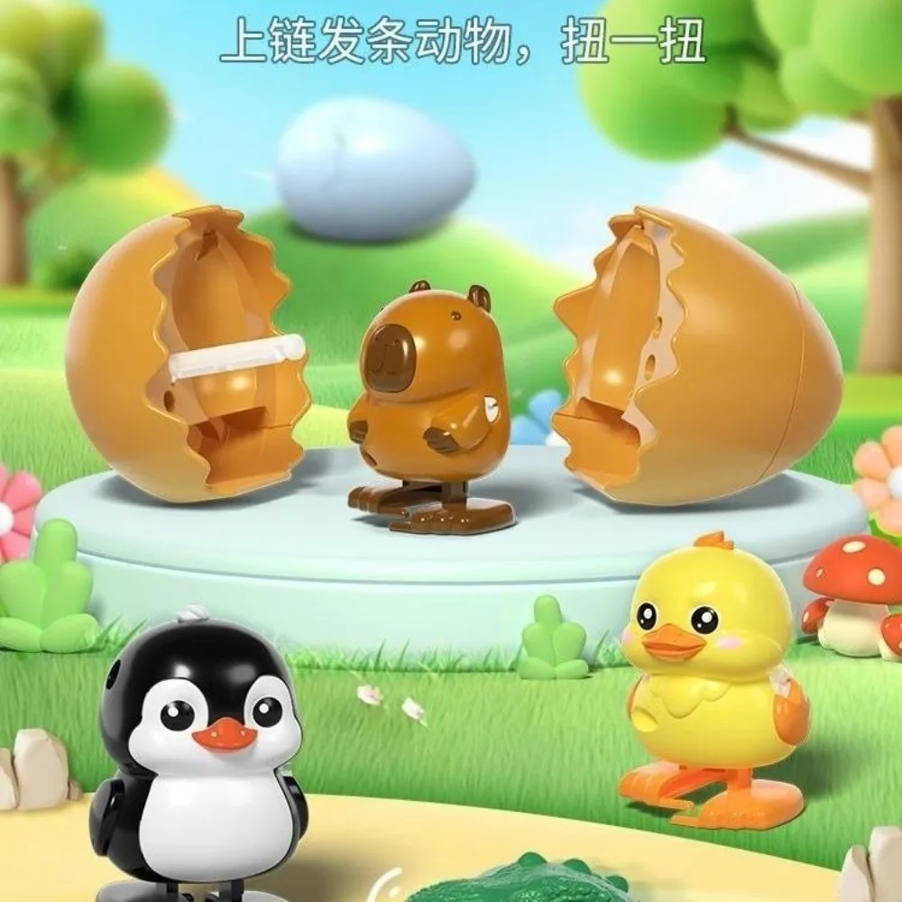 Juguete de huevo saltador de pato con mecanismo de relojería portátil, puede caminar y romper la concha, bestia bonita, pequeño pingüino, huevo saltador
