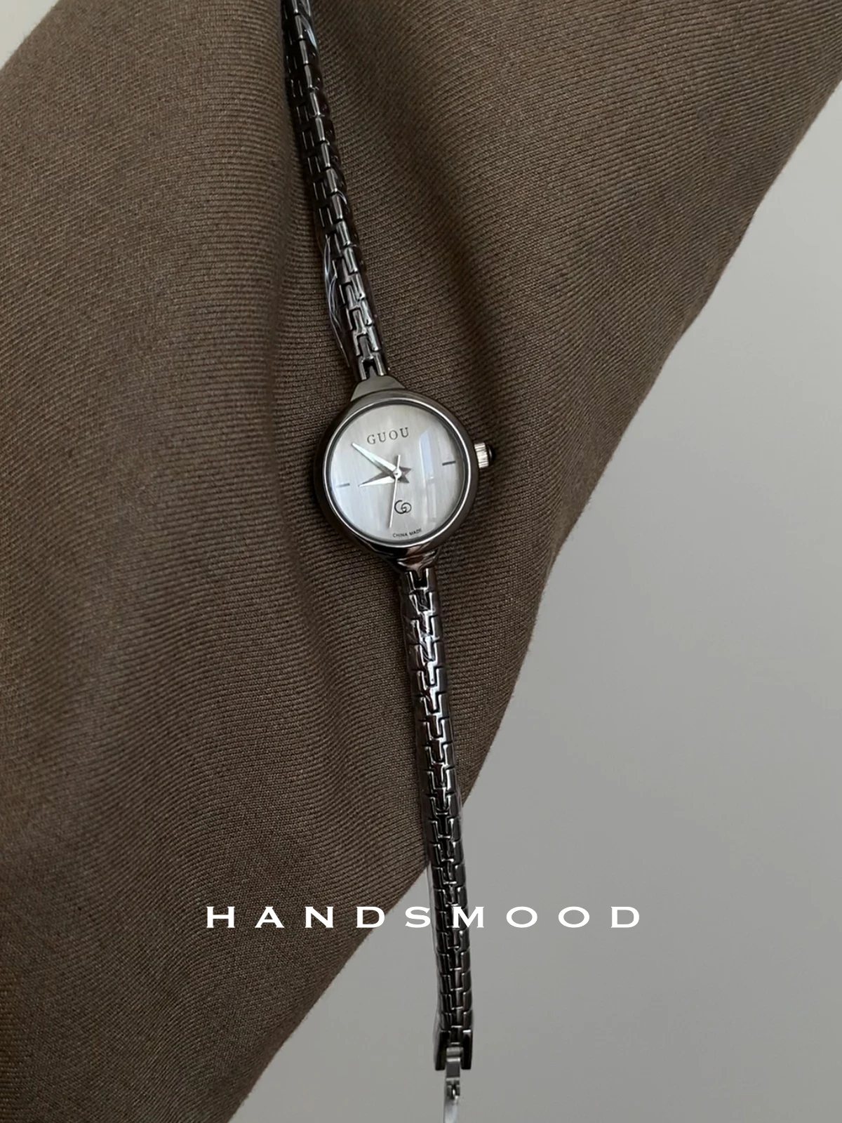 

Silver-grayround dialsophisticated and versatile women's watch with thin strap and chaina select collection of highend watches