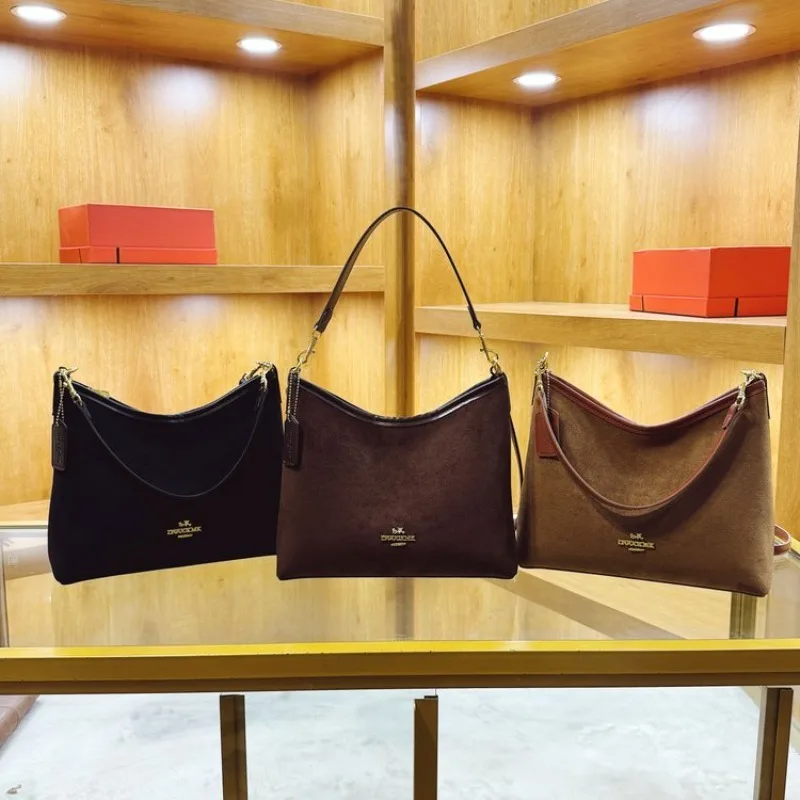 

New high-end elegant retro crossbody bag. Exquisite design. Suitable for daily commuting and casual activities.