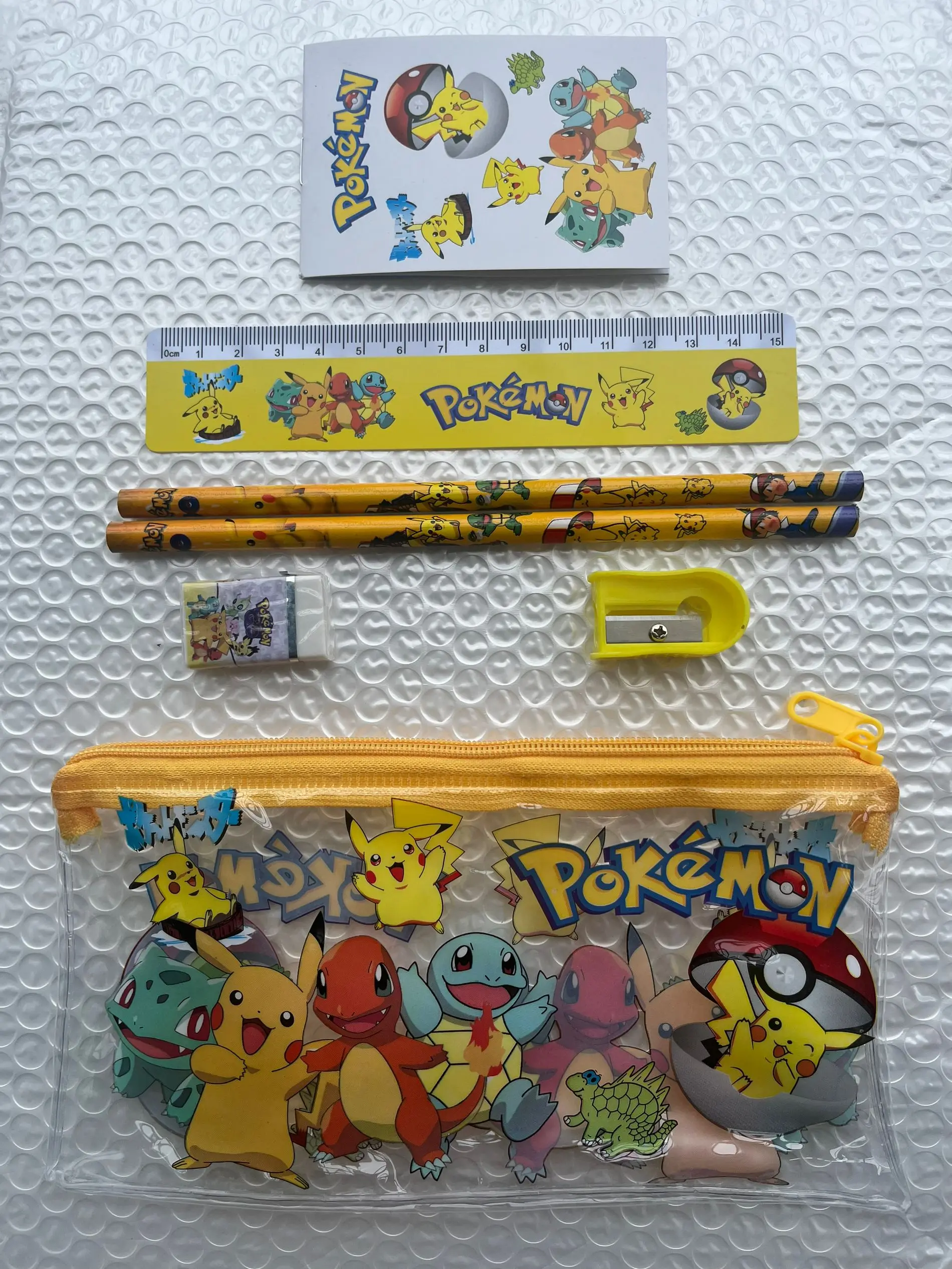 5pcs/Set Pokemon Anime Stationary Set Pikachu Cartoon Pencil Ruler Eraser Pencil Sharpener Mini Notebook Set Student Figure Toys