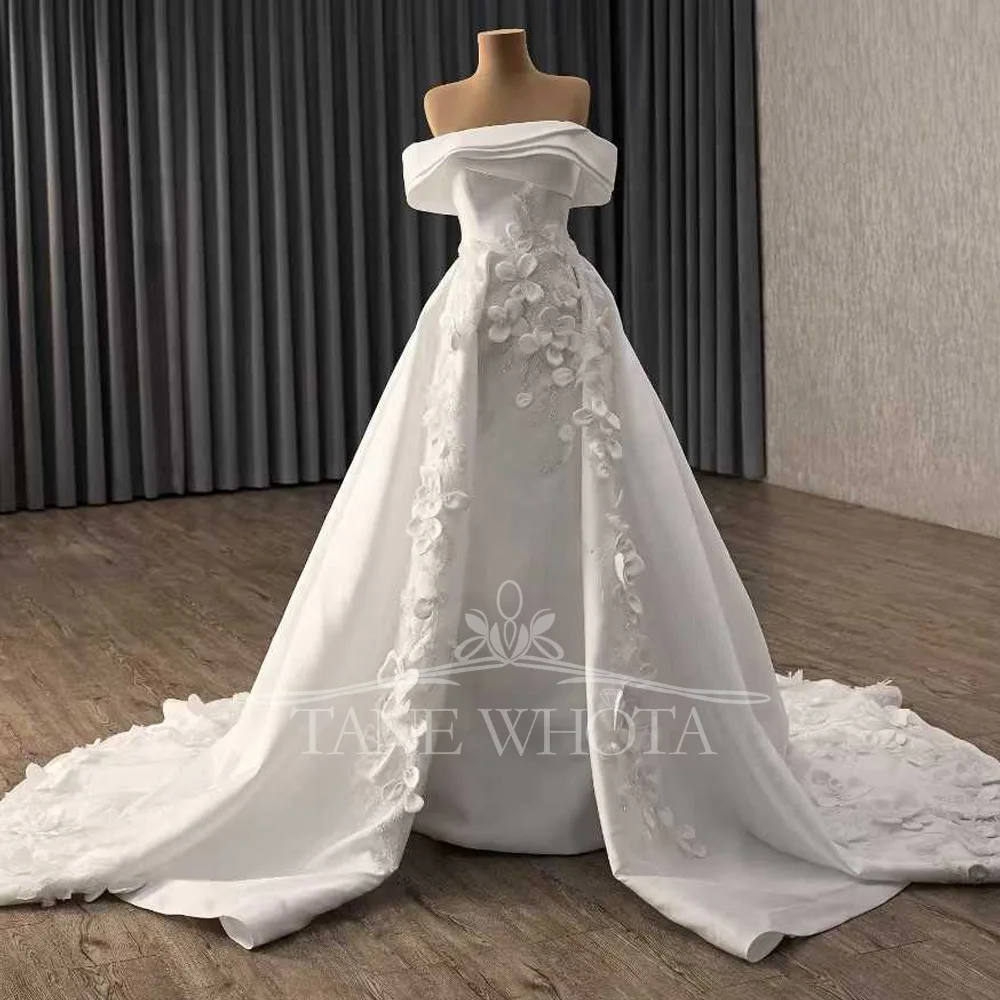 فستان زفاف Robes De Mariage 2025 بدون حمالات مكشوف الكتفين مع أربطة من الخلف ومزين بالترتر على طراز غمد