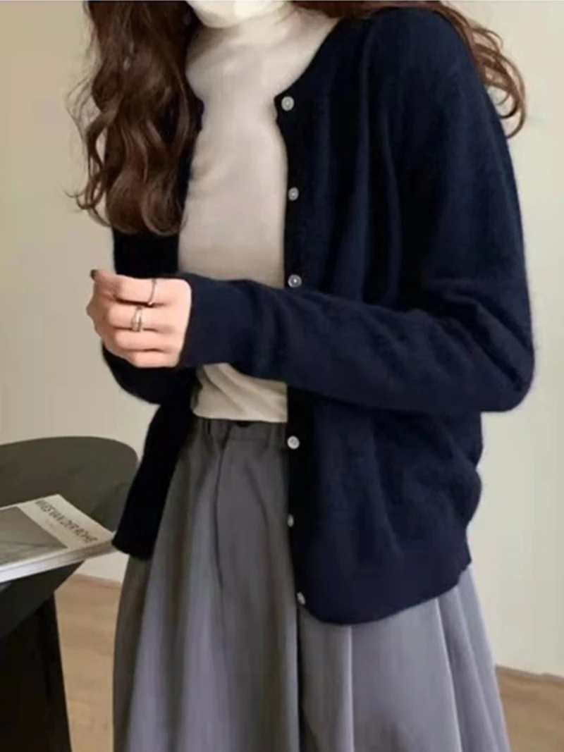 

Spring and autumn new cashmere sweater coat women cardigan thin loose T-shirt short knitting outside.