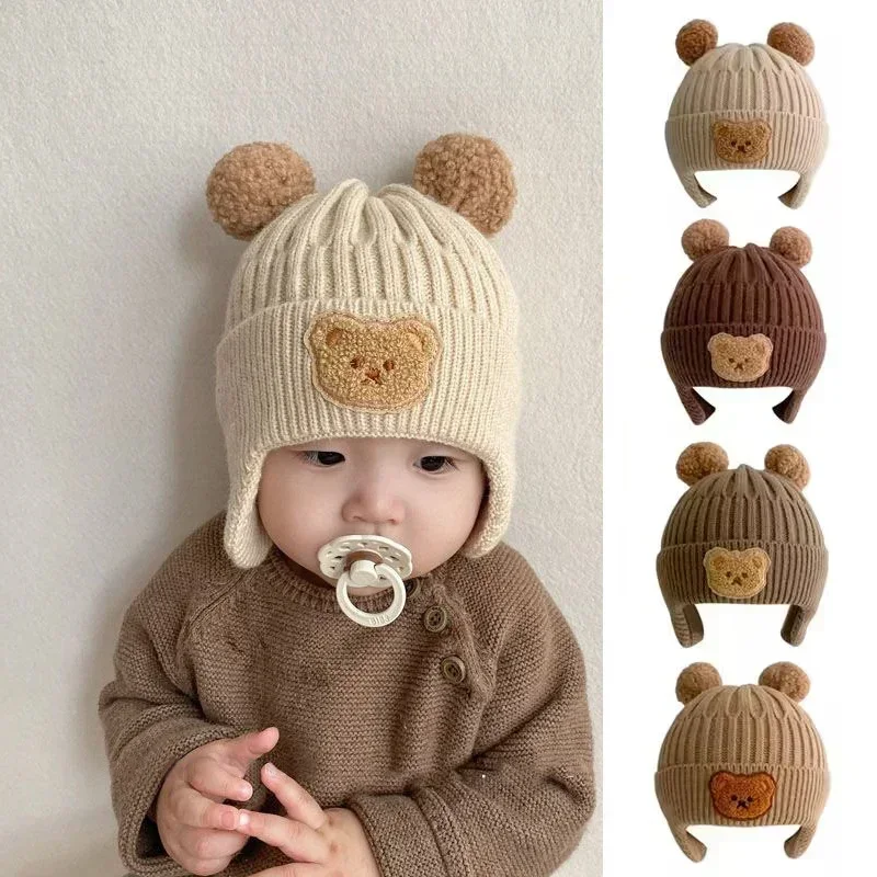 

Baby wool hat cute bear ear protection hat children winter thickened warm knitted Korean version of the baby hat