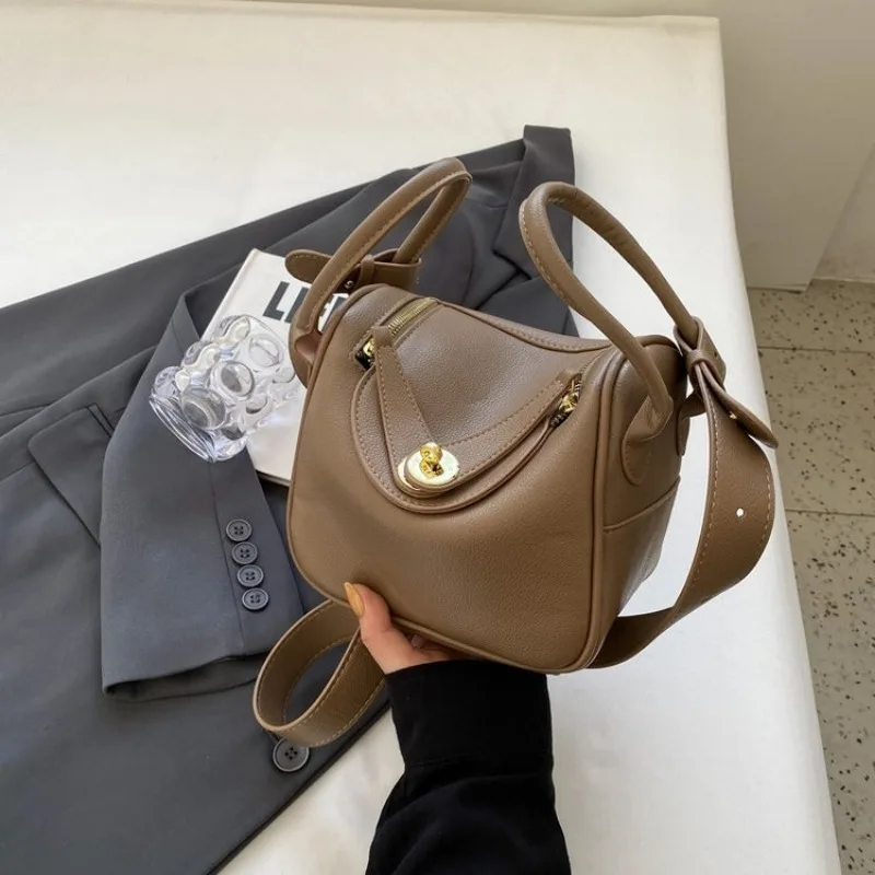 

Elegant Soft Diaper Bag Handbag One Shoulder Dinner Event Exquisite Glamorous Timeless Versatile Chic Practical