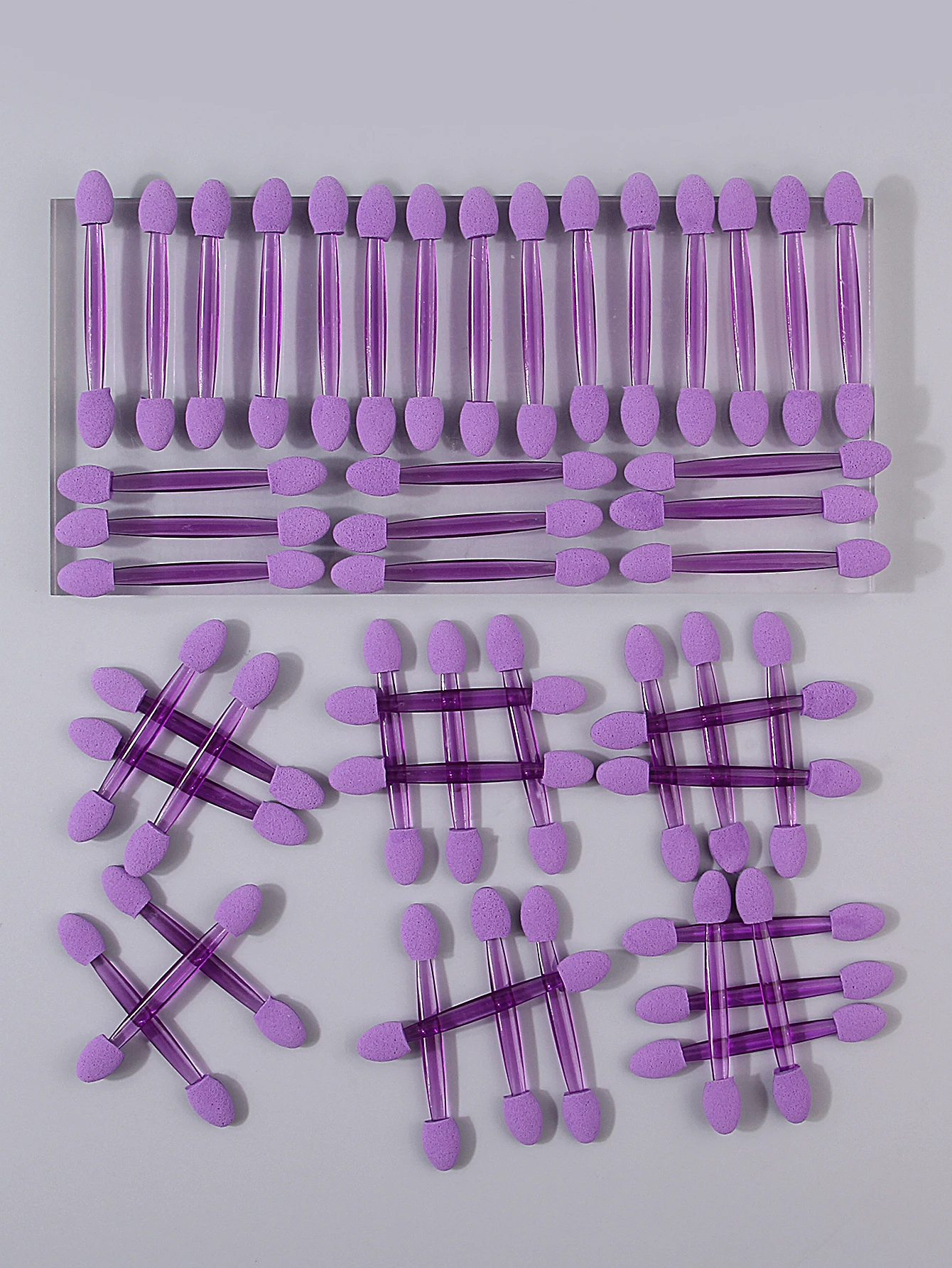 50 peças de palitos de sombra de esponja roxa de duas cabeças. As varas de esponja são purificadores/conceadores de maquiagem de olhos reutilizáveis