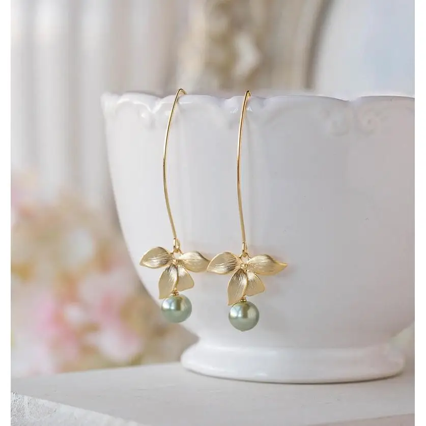 Ele Knot Pearl Earr… - image