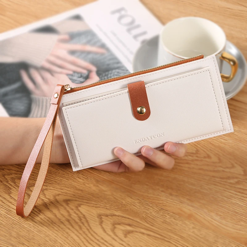 New ultra-thin women's long wallet; fashionable solid color; zipper buckle; folding and portable; multi-functional coin purse
