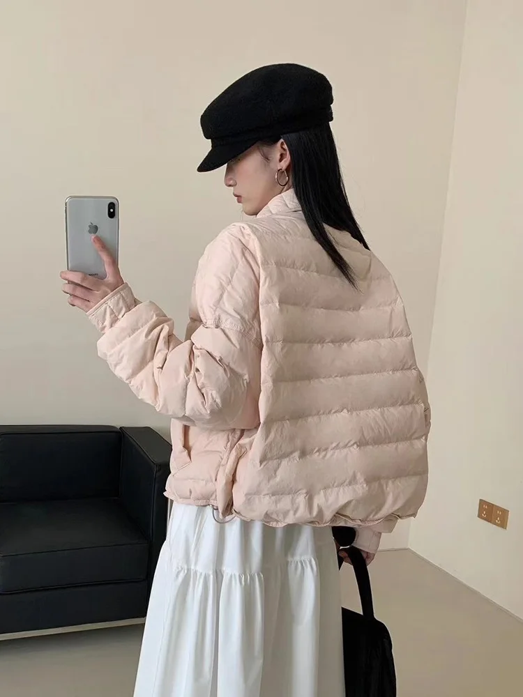 Korean version 2025 winter loose fit slimming versatile lapel down jacket women's short warm white duck down jacket