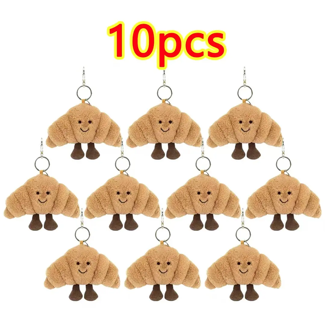 Venta al por mayor de múltiples juguetes de peluche con forma de llavero como algodón de azúcar, croissants, encurtidos, maní, cerezas, tortugas y más.