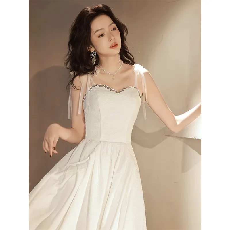 Gaun Pengantin A-line Sederhana Tali Spaghetti Putih Gaun Musim Panas Malam Seksi Wanita Gaun Midi Musim Panas Pesta Punggung Terbuka Tanpa Tali