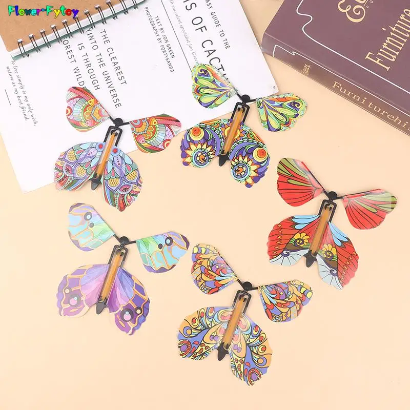 10PCS/SET Magic Wind Up Flying Butterfly Surprise Box Explosion Box in The Book Rubber Band Powered Magic Fairy Flying Toy Gift